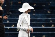 Zendaya dressed in an all-white zoot suit (Image via Noam Galai/GC Images/Getty)